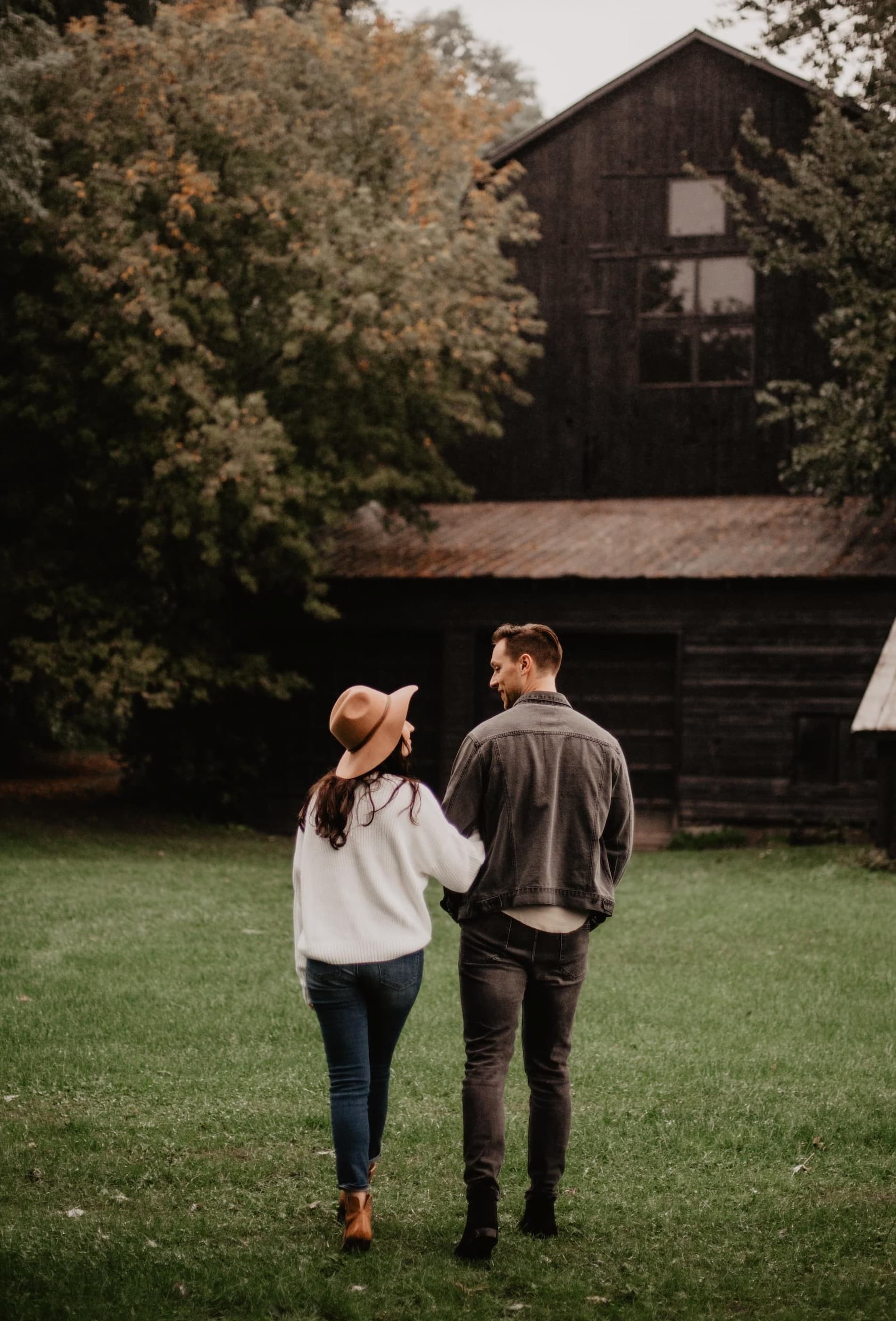 couple walking in the farm